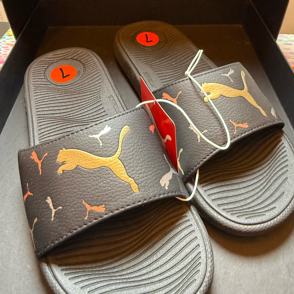 Puma Black Slides with Gold Logo